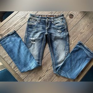 Women’s buckle jeans